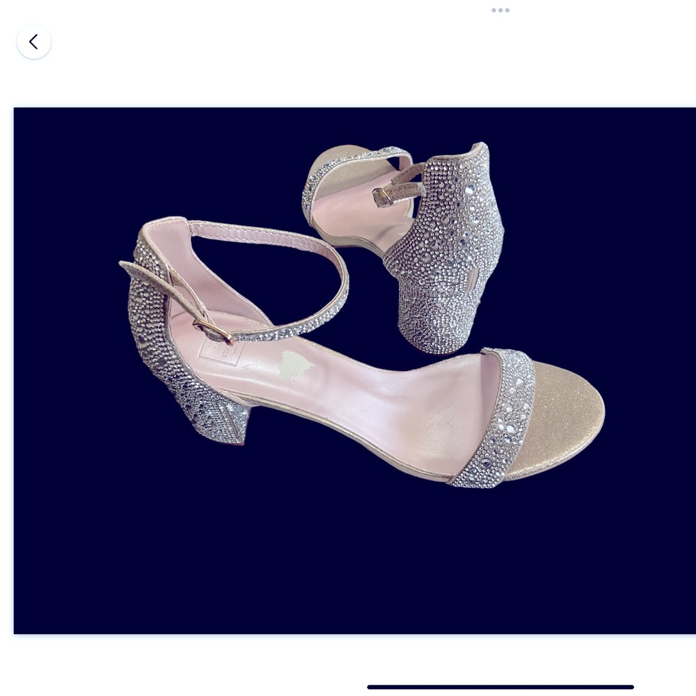 Stunning block heel featuring a shimmering, rhinestone, never worn, size 11.